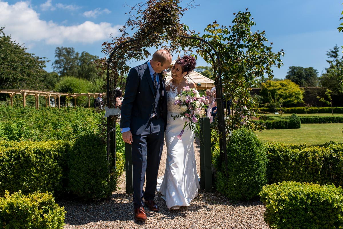 Bride and groom at their Secret garden wedding in Ashford, kent