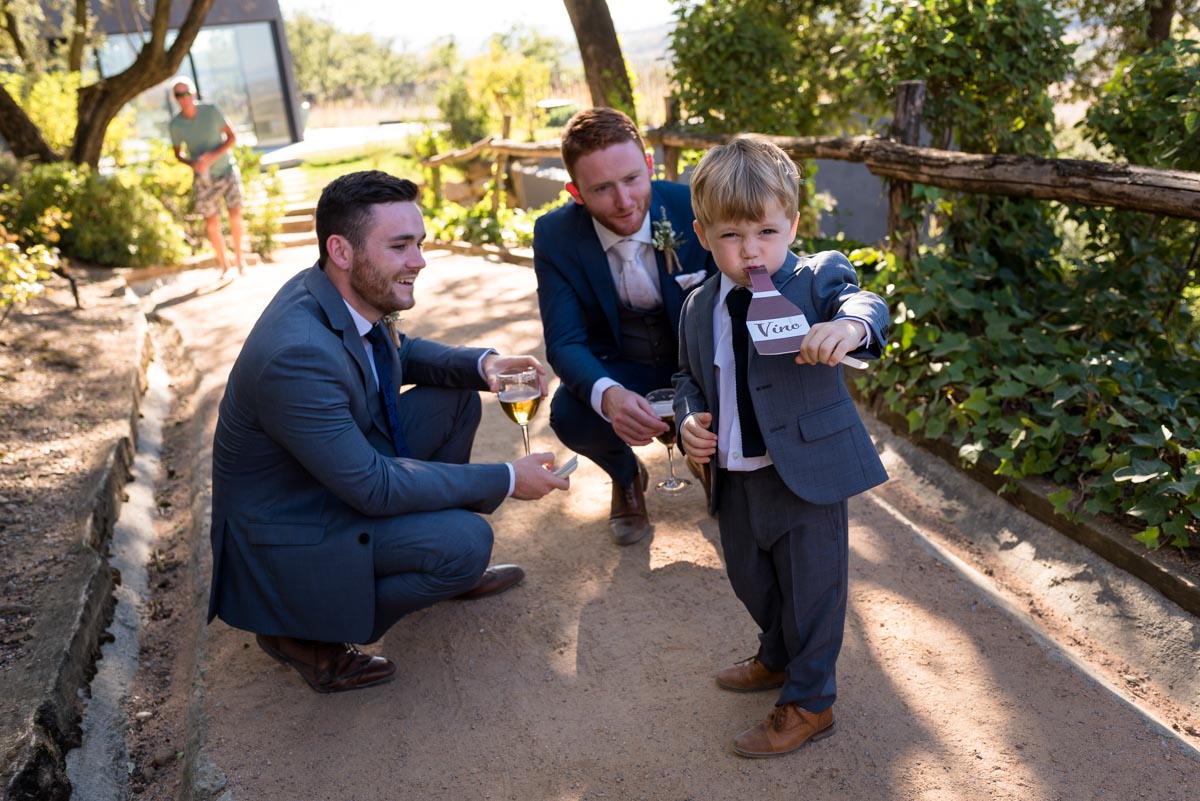 matt and page boy have fun at his wedding at castell d'emporda in Spain
