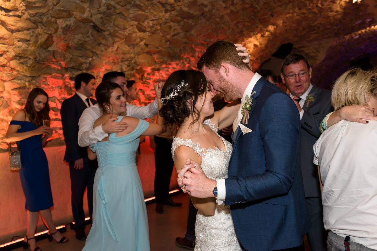 matt and rebecca photographed doing their first dance in the cave at castell d'emporda