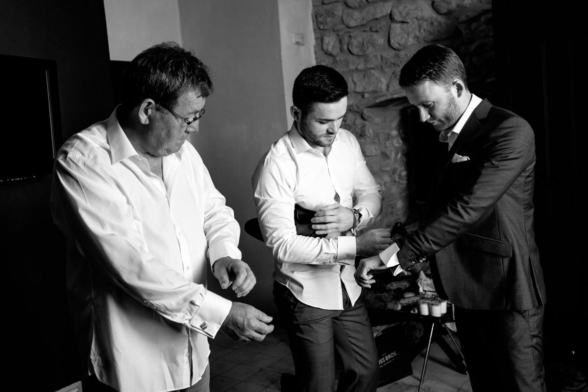 photograph of Matt and his groomsmen getting ready for his weding at castell d'emporda