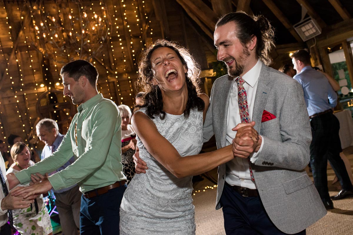 odo's Barn wedding photography, guests enjoy the dancing