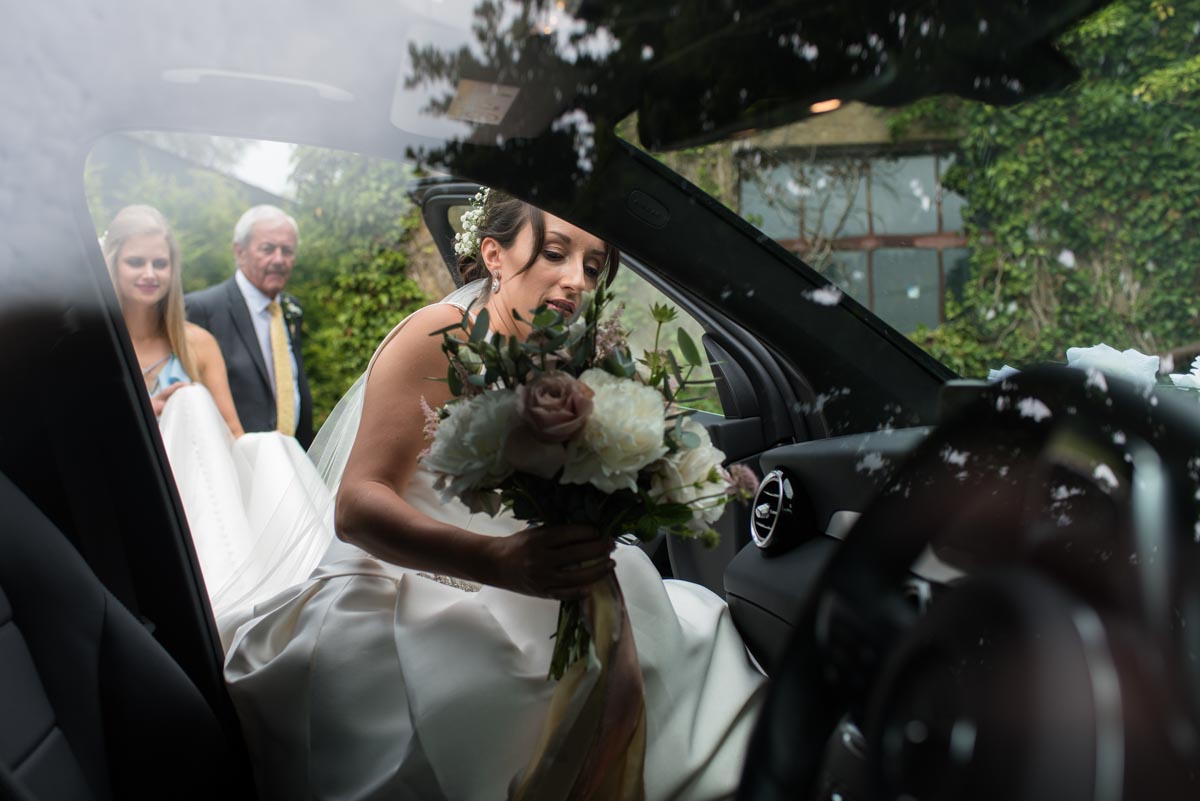 Sarah gets in the car to take her to Odo's Barn in Kent for her wedding