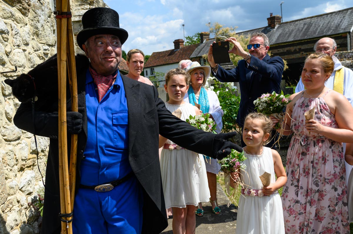 Chimney sweep at emma and Chris's wedding in Smarden Church Kent