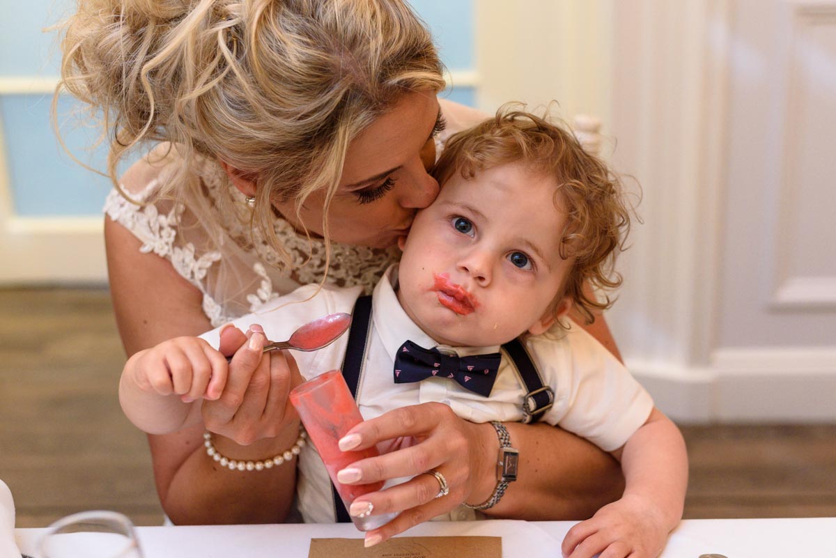 Keeley and her son enjoy wedding food at The Hythe Imperial