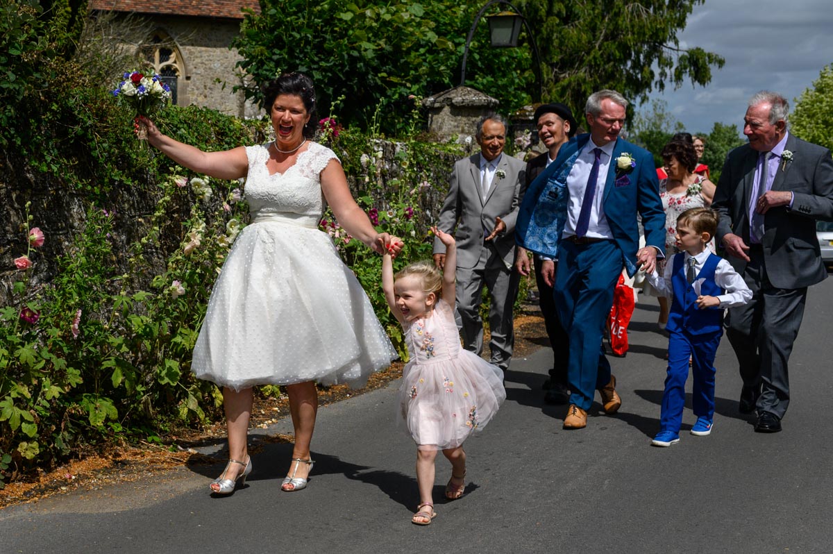 Bridal party rejoice after Egerton Church wedding