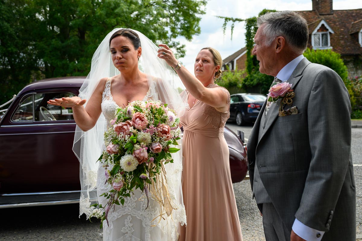 Bridal nerves show before Emma marries Chris in Smarden Church
