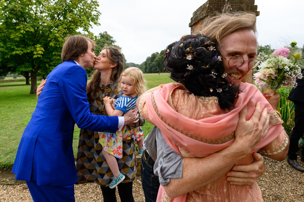 Kisse and cuddles for guests at Doug and Vinitas Kent wedding at Chilston Park