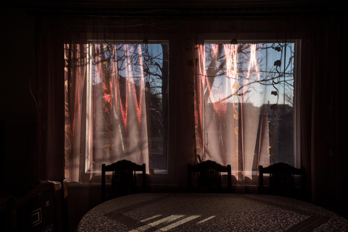Afternoon light shining through pink curtains in Gyumri, Armenia