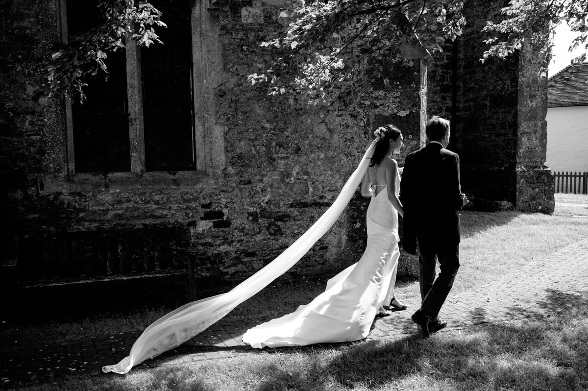 wedding photography best of 2021 photograph of clare and richard leaving the church after their kent wedding ceremony