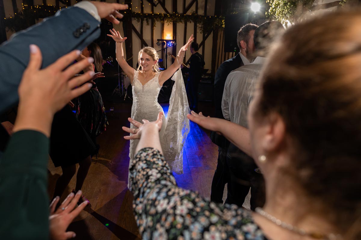 wedding photography best of 2021 photograph of bride dancing at wedding reception in tunbridge wells kent