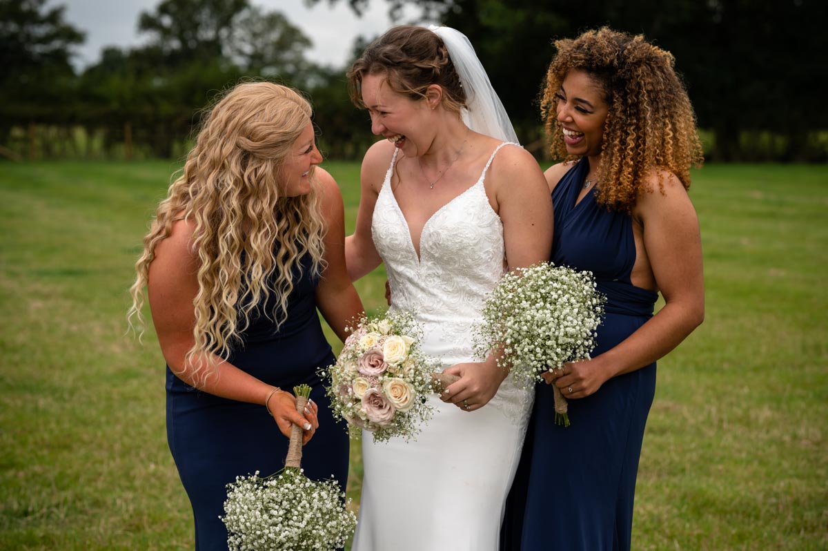 wedding photography best of 2021 photograph of grace and her bridesmaids at her wedding in kent