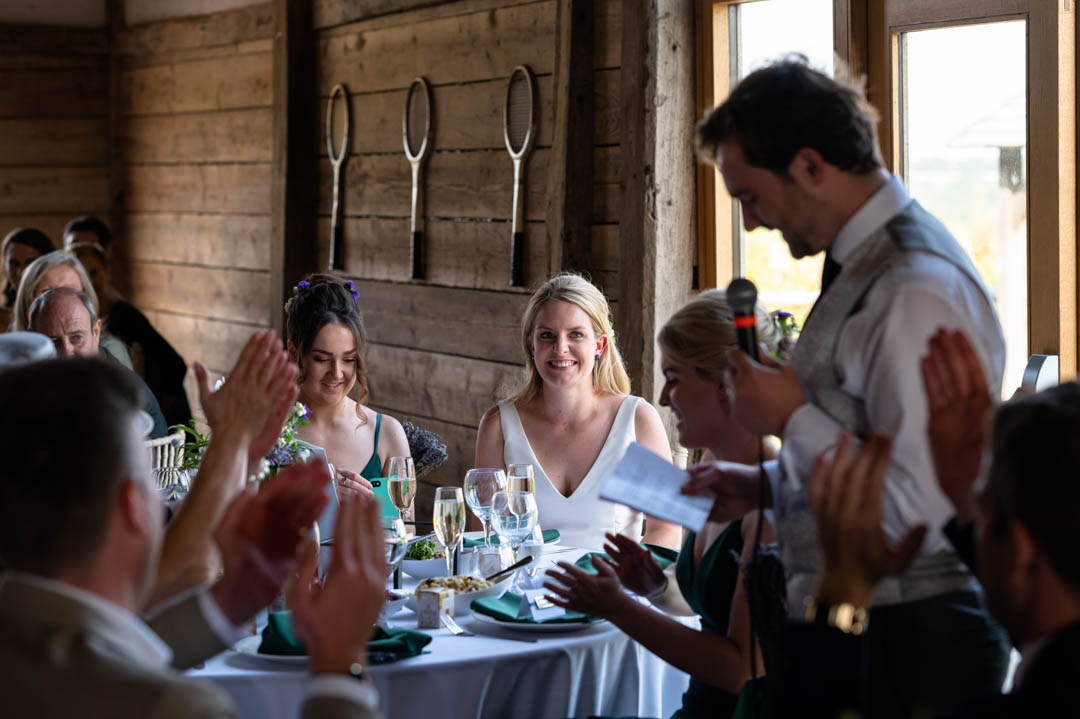 Photograph of wedding speeches on Chris and Fionas wedidng day at The Cherry barn in Peasmarsh