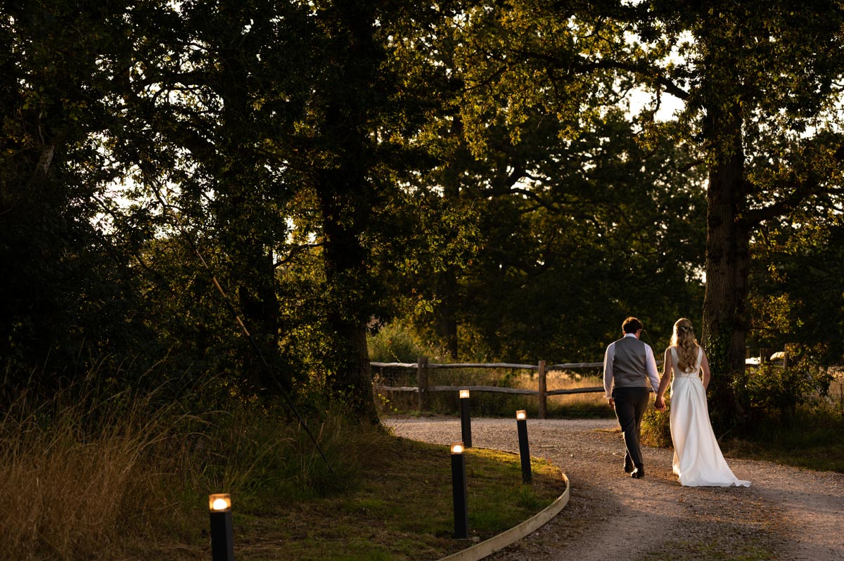 Photograph of Fiona and Chris during their wedding portrait session at The Cherry Barn in East Sussex