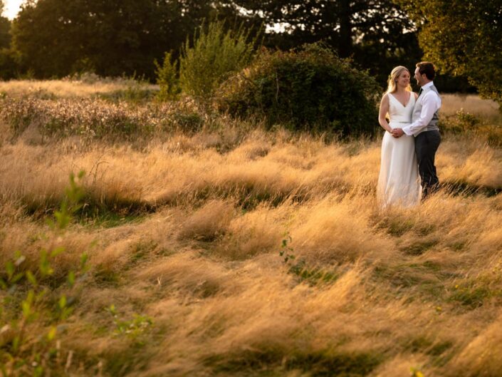 Sunset photogra[h of bride and groom at The Cherry Barn wedding venue
