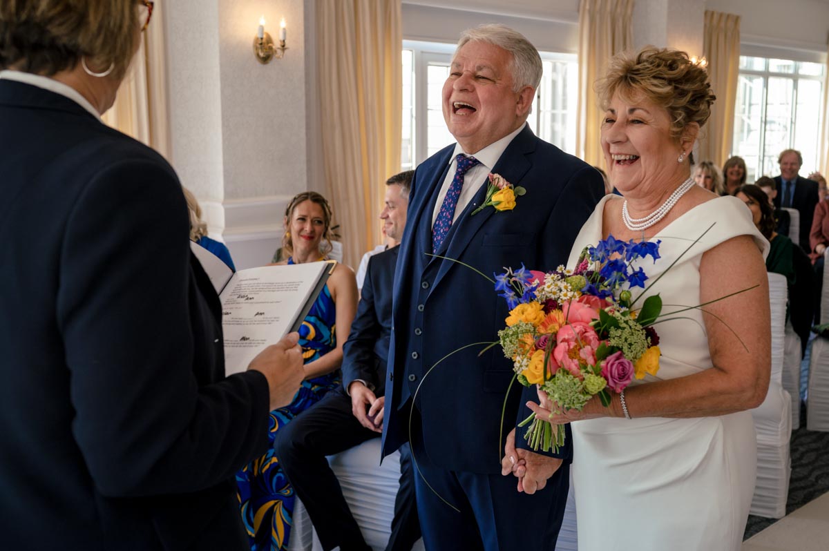 Hythe Imperial wedding. Photograph of Ann and Alan during their ceremony in the Elizabeth room