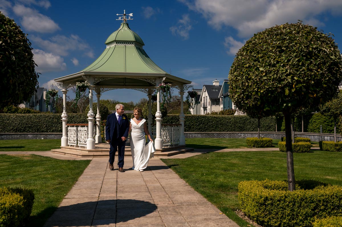 Photograph of Ann and Alan on their wedding day in the gardens of the Hythe Imperial Hotel