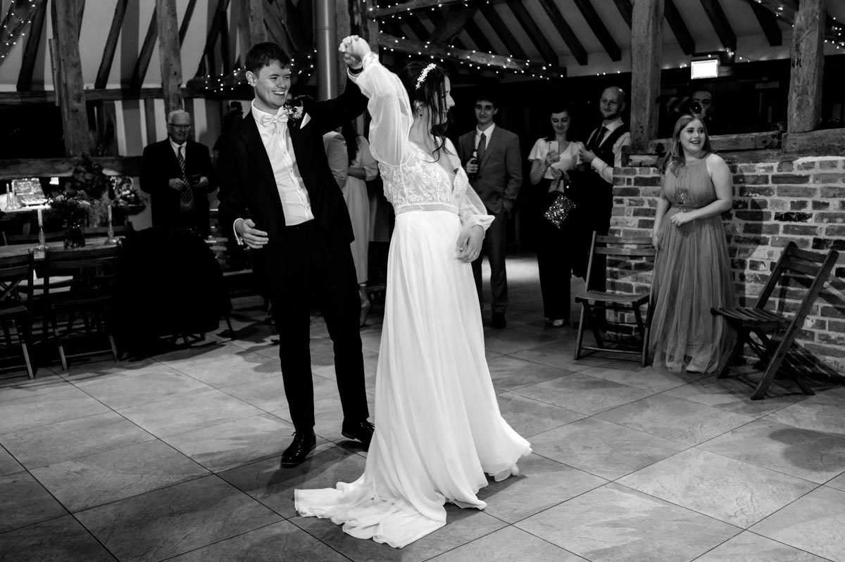 The Oak barn, Frame Farm wedding venue showing Sophia and Will photographed doing their first dance