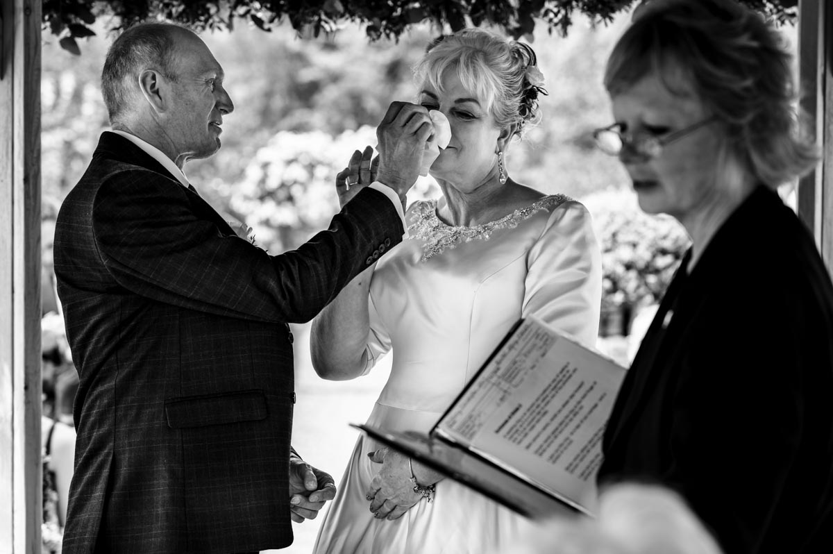 wedding photography at the secret garden in kent. ceremony in the outdoor gazebo