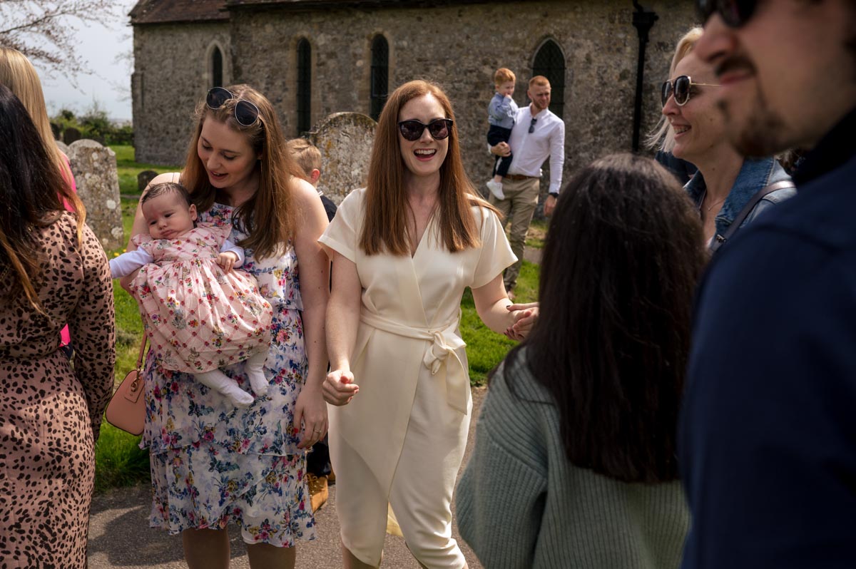 Guests photographed greeting each other before Kent christening