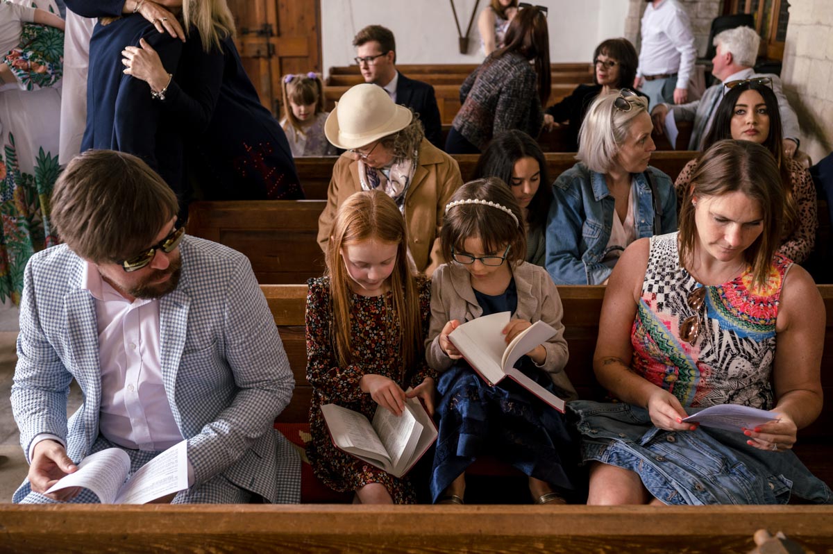 Photograph of congregation inside church before Ruperts christening in Kent