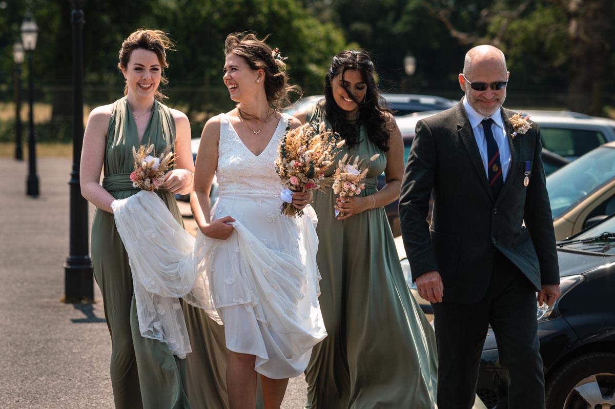 Becca and her bridesmaids arrive for her wedding at the secret garden in Kent
