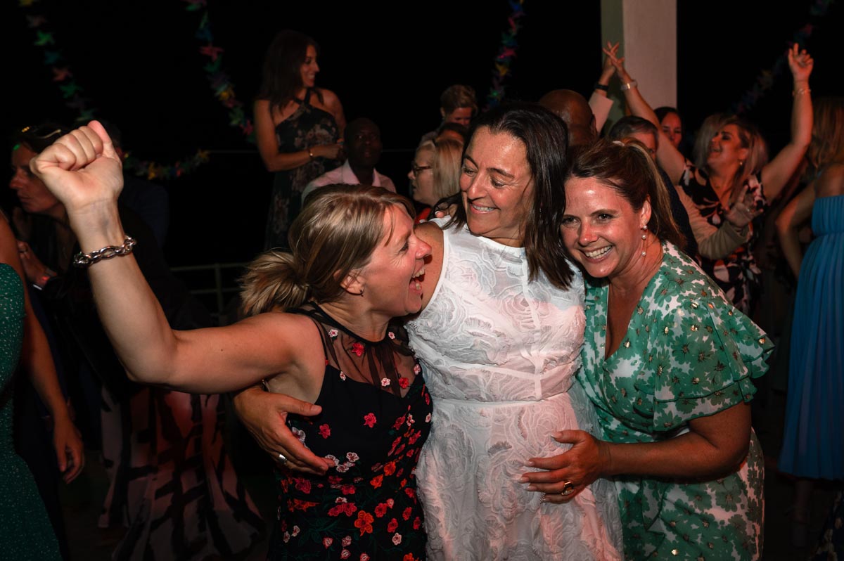 Photograph of bride and friends at wedding reception in Saltdean