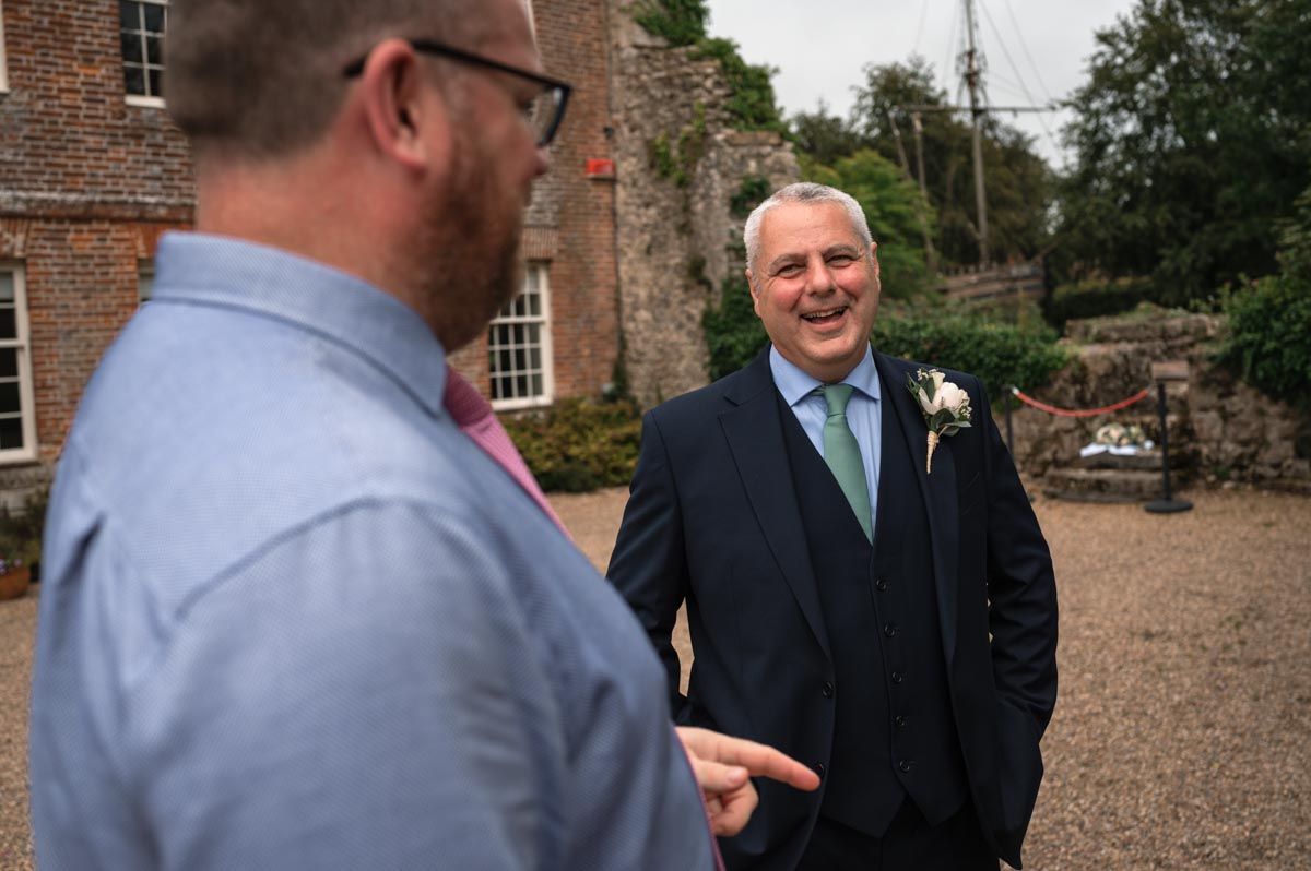 westenhanger castle wedding - phil and friend laughing