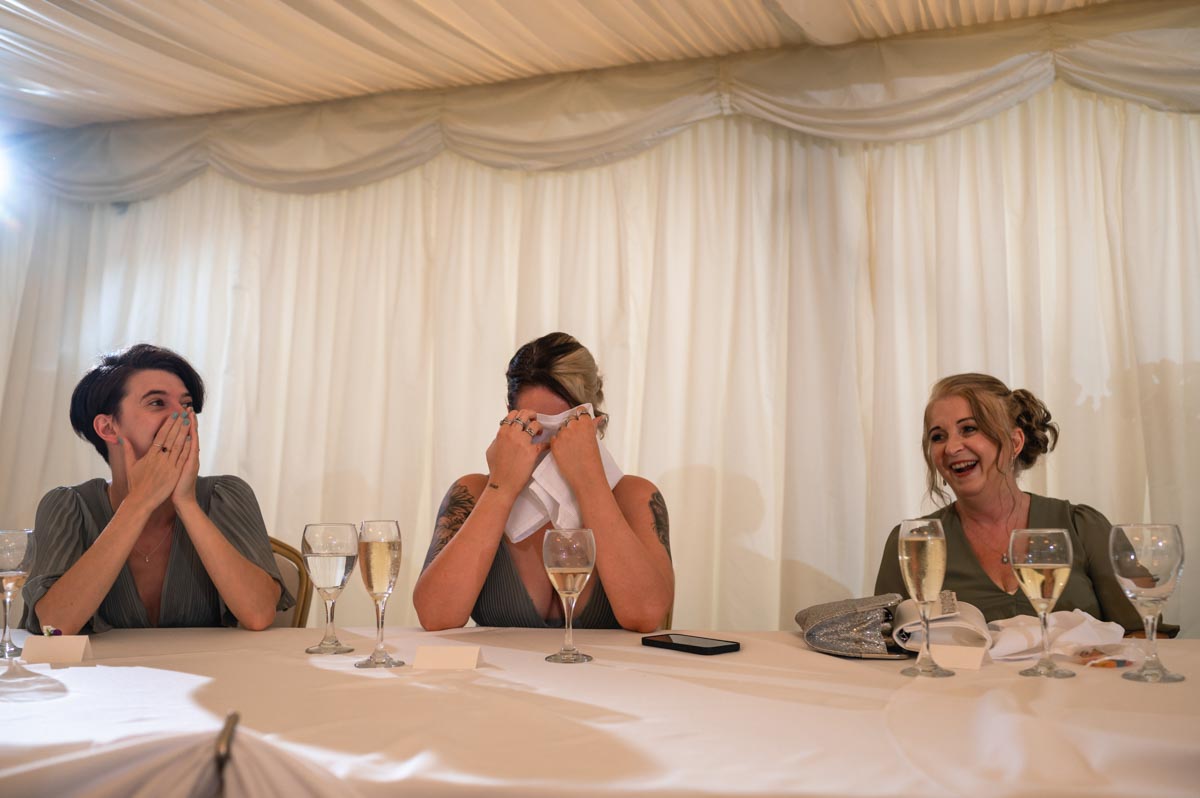 guests react to speeches during westenhanger castle wedding in kent