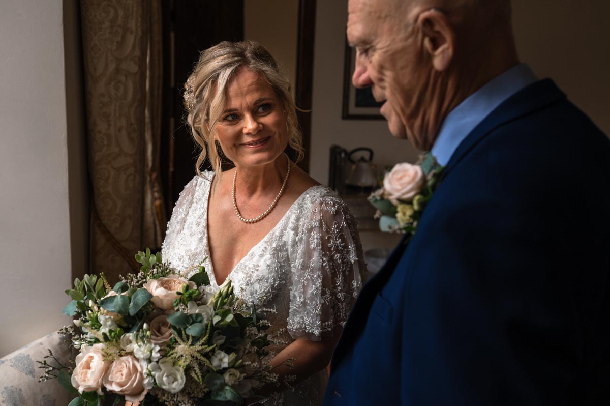 bride and father photographed before her wedding at westenhanger castle in Kent