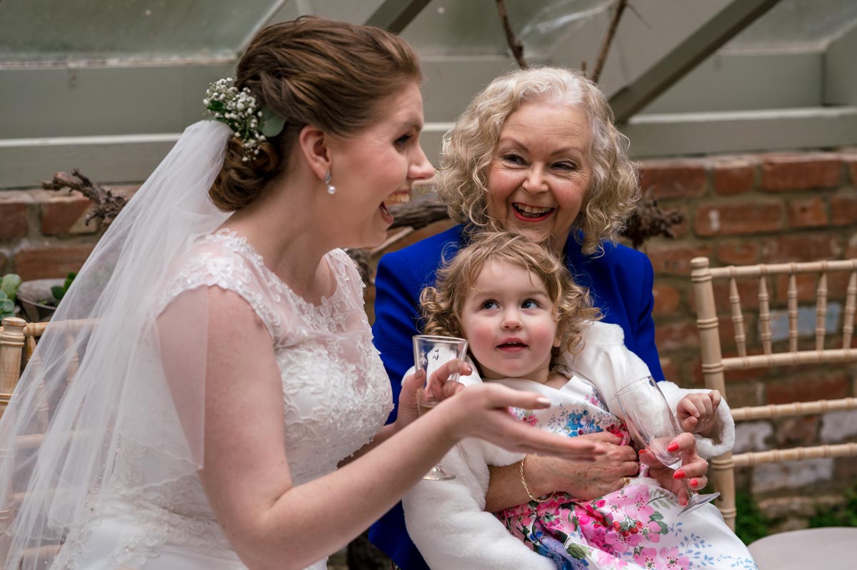 The secret garden wedding photography. Bride and her mum and daughter