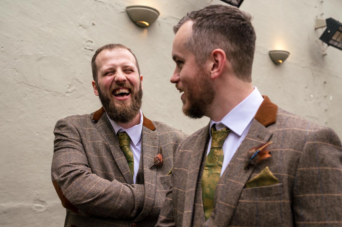 The Secret Garden wedding photography. Jacob and best man laughing before ceremony