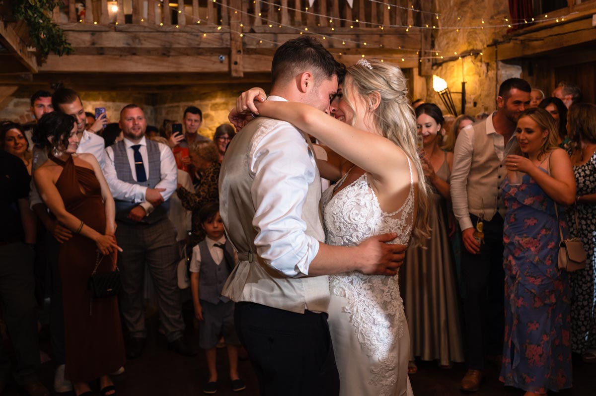 Bride and groom first dance photo at swallows oast wedding venue