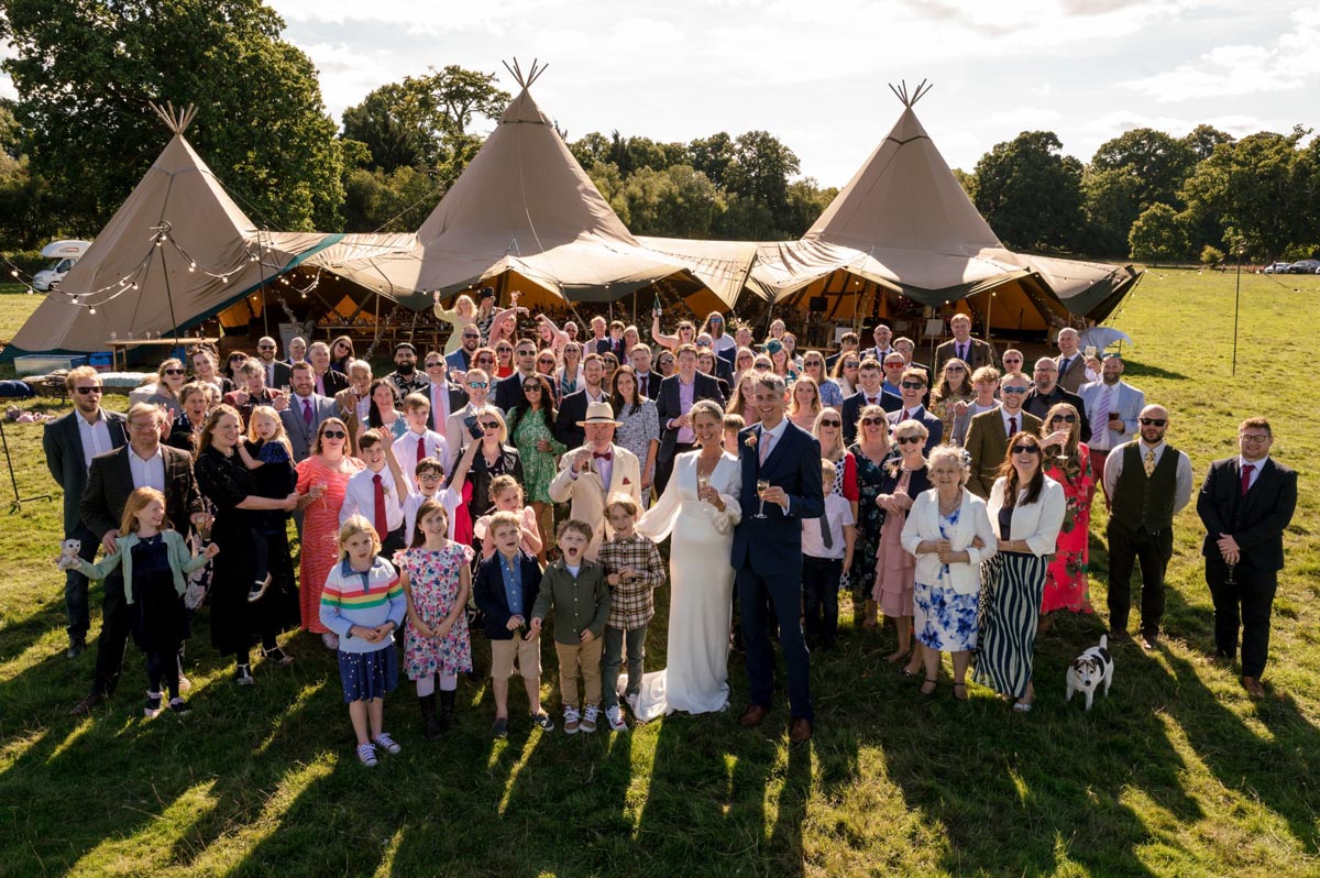 Group photo of all wedding guests. an example of how I approach photographing your wedding