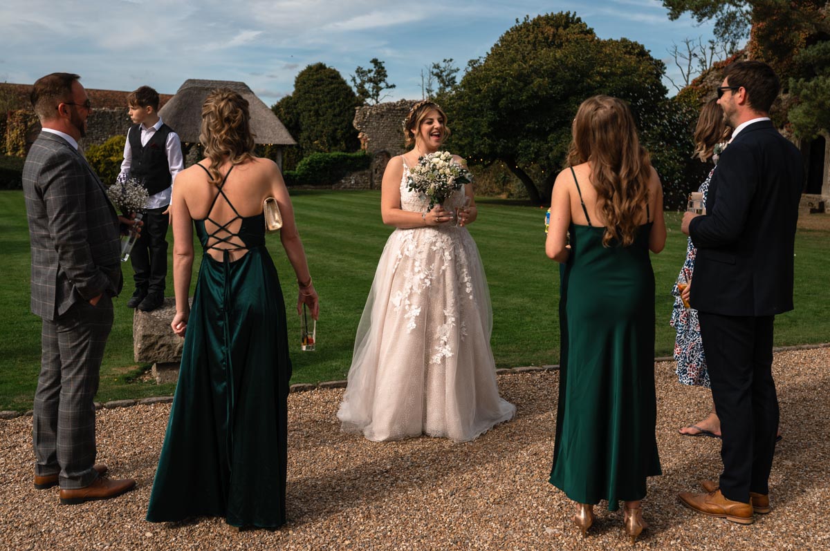 paige and guests at her westenhanger castle wedding