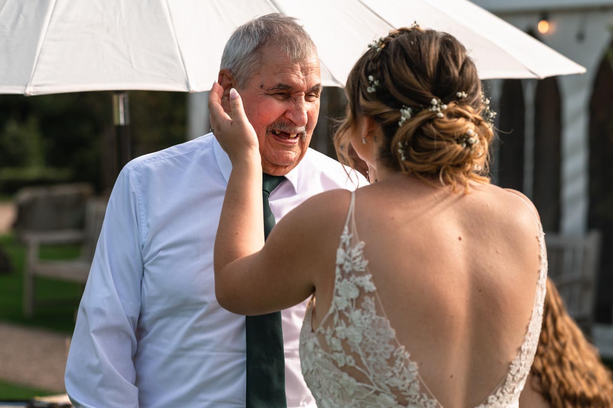 paige and her uncle photographed at her westenhanger castle wedding