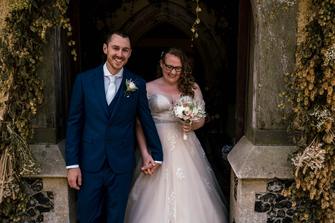why i love photographing small weddings. Jade and richard exiting the church after their intimate ceremony