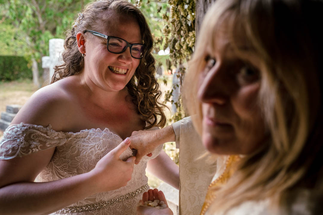 Jade and her mum, who was also the Vicar, getting confetti out after her small wedding ceremony in Kent
